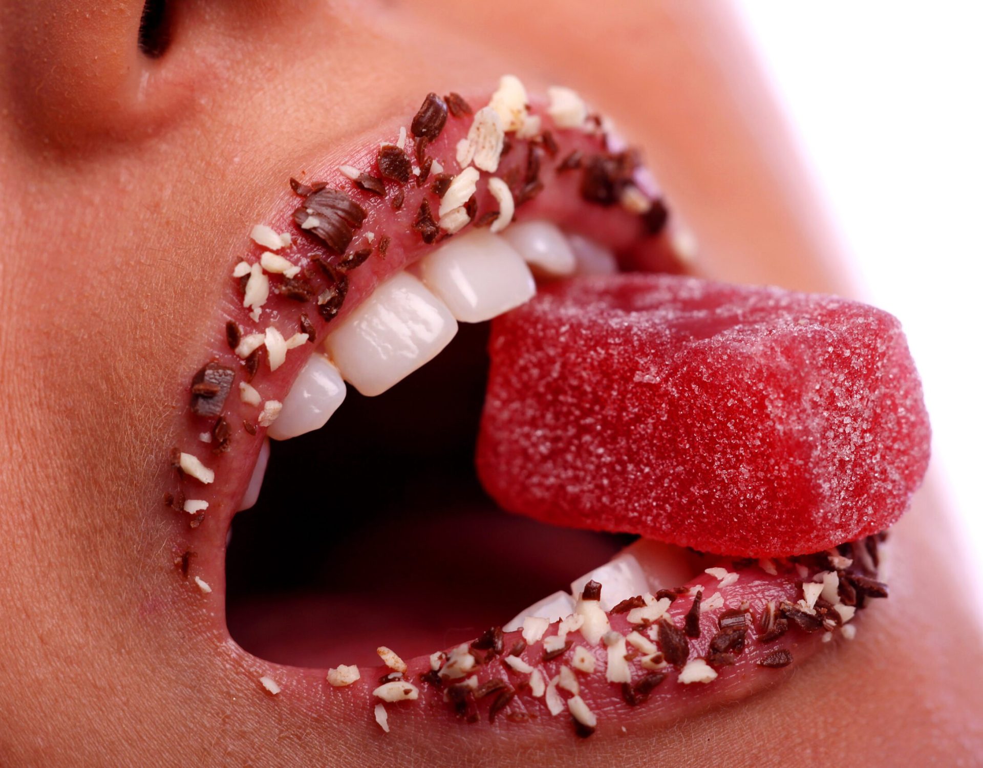 a woman mouth with candy inside